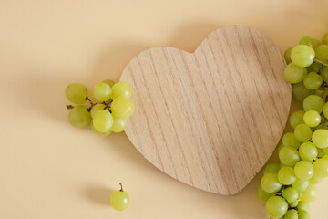 showcase for your product with grapes beige background