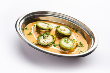Shaam Savera is a spinach kofta curry where stuffing is made from paneer and the kofta made from spinach