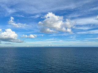 Naklejka na ściany i meble A view of a sunny day on the Caribbean Sea from a cruise ship.