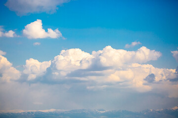 Beautiful clouds against the blue sky. Fluffy clouds, cloudy weather.