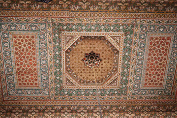 Arabic style wooden coffered ceiling in a palace in Marrakech