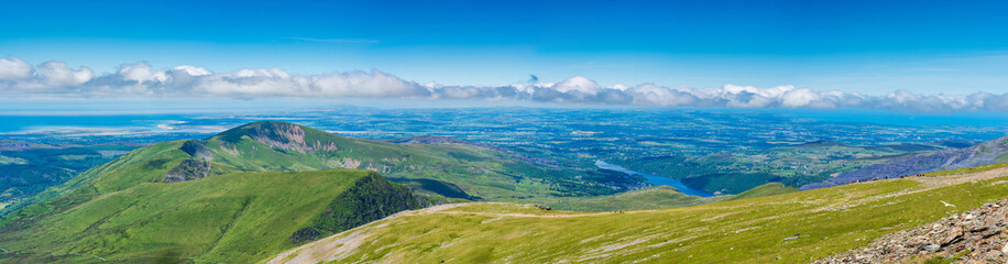 Fototapeta na wymiar A scenic panoramic view from Mount Snowdon on a bright sunny day, Wales