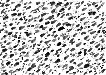 Watercolor black and gray daub on a white background. Blots and splashes are dynamically placed on the background. Abstract monochrome texture.