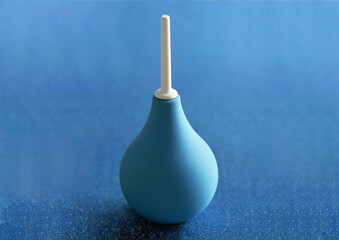 blue hand cleansing enema on beautiful background