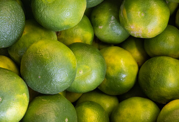 green mandarin in a market