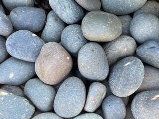 Fototapeta na wymiar Closeup of various stones in the river