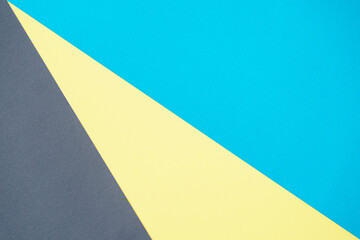 Blue, black, yellow, three tone color paper background with stripes. Abstract background modern...