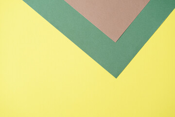 Brown, yellow, green, three tone color paper background with stripes. Abstract background modern...