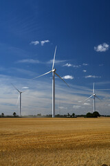 wind turbine wind farm producing green clean renewable energy