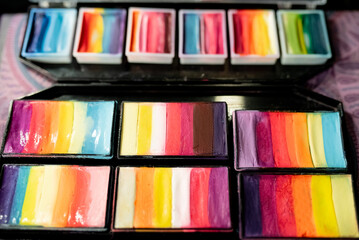 light soft multi-colored plasticine is laid out in the form of a circle, a copy space. Plasticine for children's creativity, art modeling