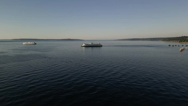 Beautiful view of ferry departure from Edmonds, WA to Kingston, WA at sunset