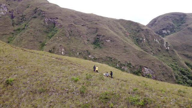 4 young people on a mountain near Samaipata - Bolivia