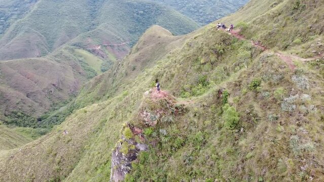 Group of young people hiking in the mountains near Samaipata Bolivia - CODO DE LOS ANDES - SANTA CRUZ BOLIVIA