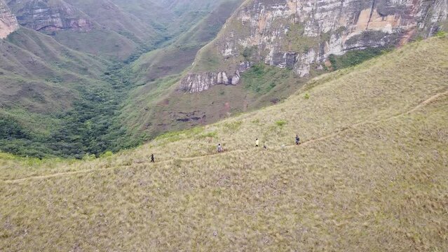 Group of young people hiking in the mountains near Samaipata Bolivia - CODO DE LOS ANDES - SANTA CRUZ BOLIVIA