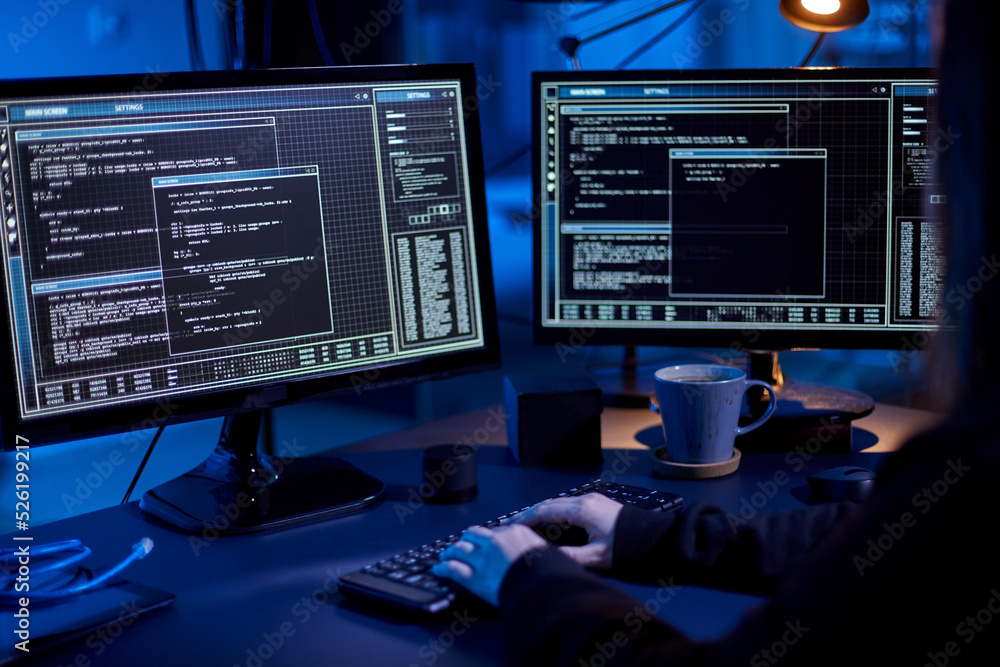 Poster cybercrime, hacking and technology concept - close up of female hacker in dark room writing code or 