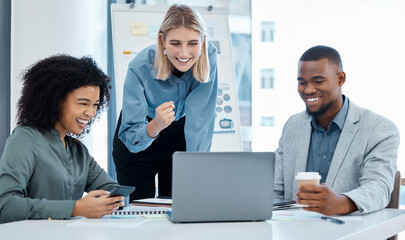 Success, collaboration and teamwork with business team reading good news on a laptop in a corporate...