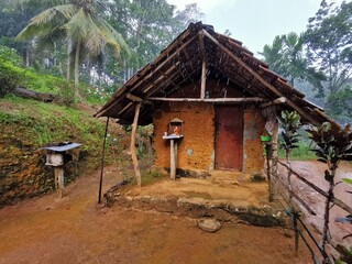 cottage type wooden house in the woods. wall make from clay. Sri Lankan ancient house in the rural village. 