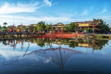 Fototapeta na wymiar Thu Bon and fishing net reflection
