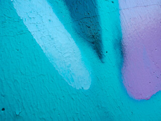 Bright streaks of paint on a wall. Empty abstract background.