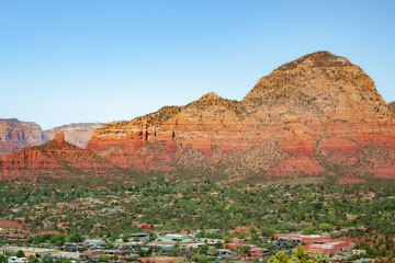 City and red rock mountain cliff and forest view at Airport Mesa Sedona Arizona