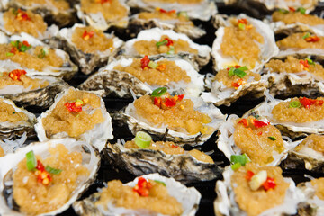 Traditional grilled seafood oysters on the grill