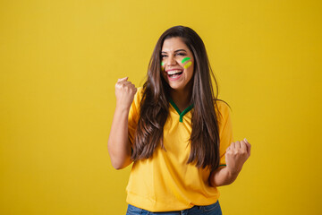 Woman supporter of Brazil, world cup 2022, football championship, celebrating, partying.