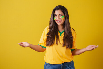 Woman supporter of Brazil, world cup 2022, football championship, with open arms, welcome.
