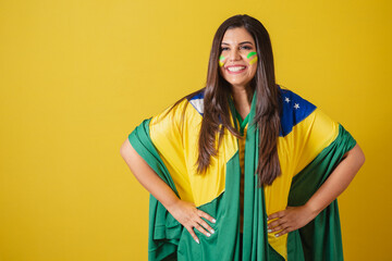 Woman supporter of Brazil, world cup 2022, football championship, using flag as cape, brazil flag...