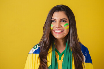 Woman supporter of Brazil, world cup 2022, soccer championship, using brazil flag as cover....