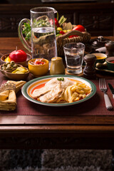 Fried chicken filet with french fries and rice peruvian gourmet restaurant comfort food