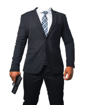 Template of a gunman wearing a black suit and holding a pistol isolated included with clipping path.