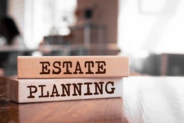 Estate Planning text concept written on wooden blocks lying on a table