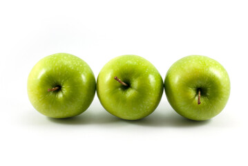 Three green apples arranged horizontally isolated on a white background.