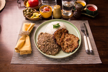 Lentils stew with hamburguer tuna tortilla peruvian gourmet restaurant comfort food
