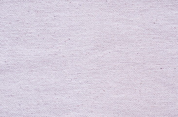 Close-up of natural fabric texture. Light lilac cloth background. Natural linen or cotton textile material.