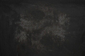 Grunge cement concrete wall background. Close up of dark black mortar wall texture for design.