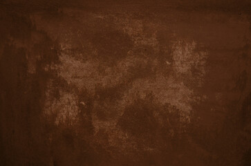 Grunge cement concrete wall background. Close up of chocolate brown mortar wall texture for design.
