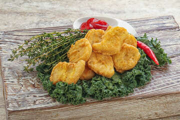 Crispy chicken nuggets with tomato ketchup