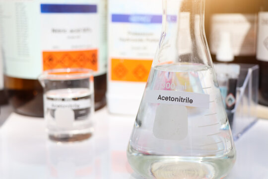 acetonitrile in glass, chemical in the laboratory and industry