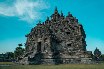 Fototapeta na wymiar Plaosan Temple, a Buddhist temple relic of the ancient Mataram kingdom with a magnificent building and still very clean with a blue sky background