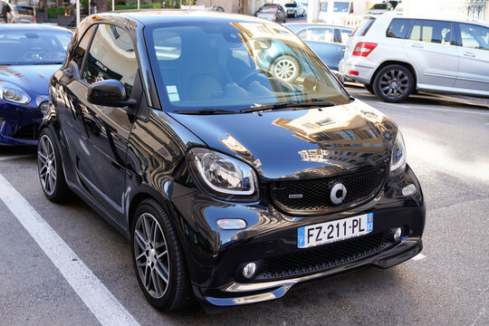 smart brabus car small black little parked in street
