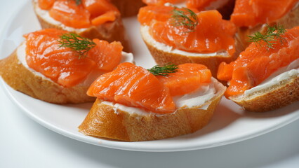 Open sandwiches with trout fillet ,wheat bread with butter and herbs