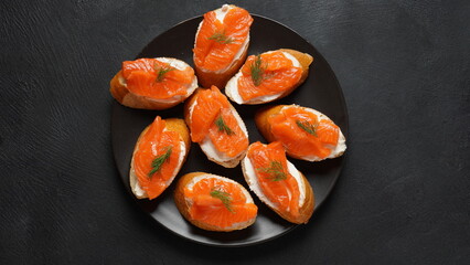 Open sandwiches with trout fillet ,wheat bread with butter and herbs
