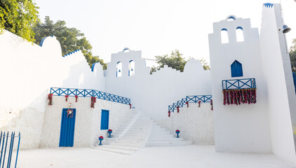 Architectural view of a castle painted with white and blue colour.