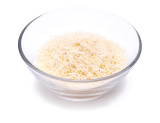 grated Parmesan cheese in glass bowl isolated on white background