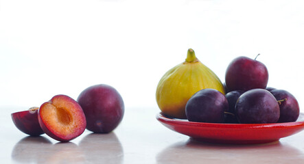 red plums and yellow figs