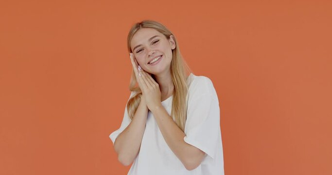 Hilarious joke. Portrait of happy optimistic girl with long hair laughing out loud