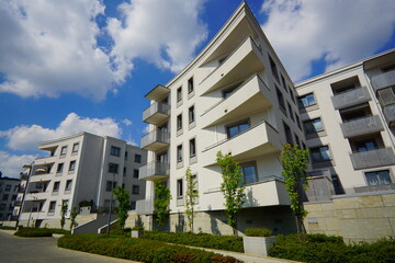 Obraz premium Mix of old and modern architecture - A typical housing estate, fenced and guarded