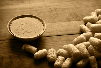 Corn sticks on wooden background