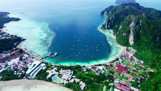 Koh phi phi island at thailand. Aerial drone view from island  coast line. sunny day resort and hotels blue wateer